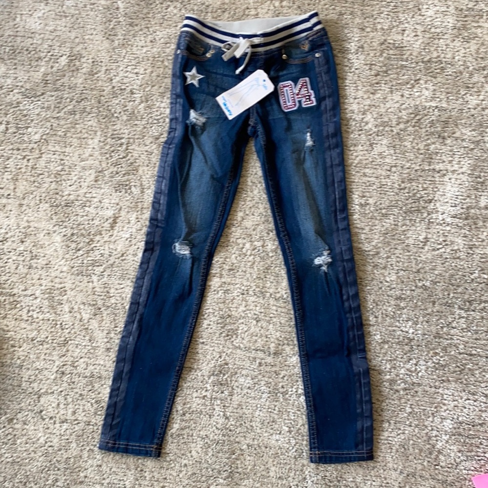 Never worn Justice jeans